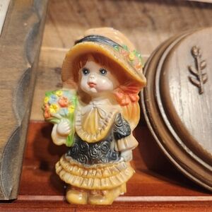 1970's Molded Plastic Girl Holding Flowers 3" Tall